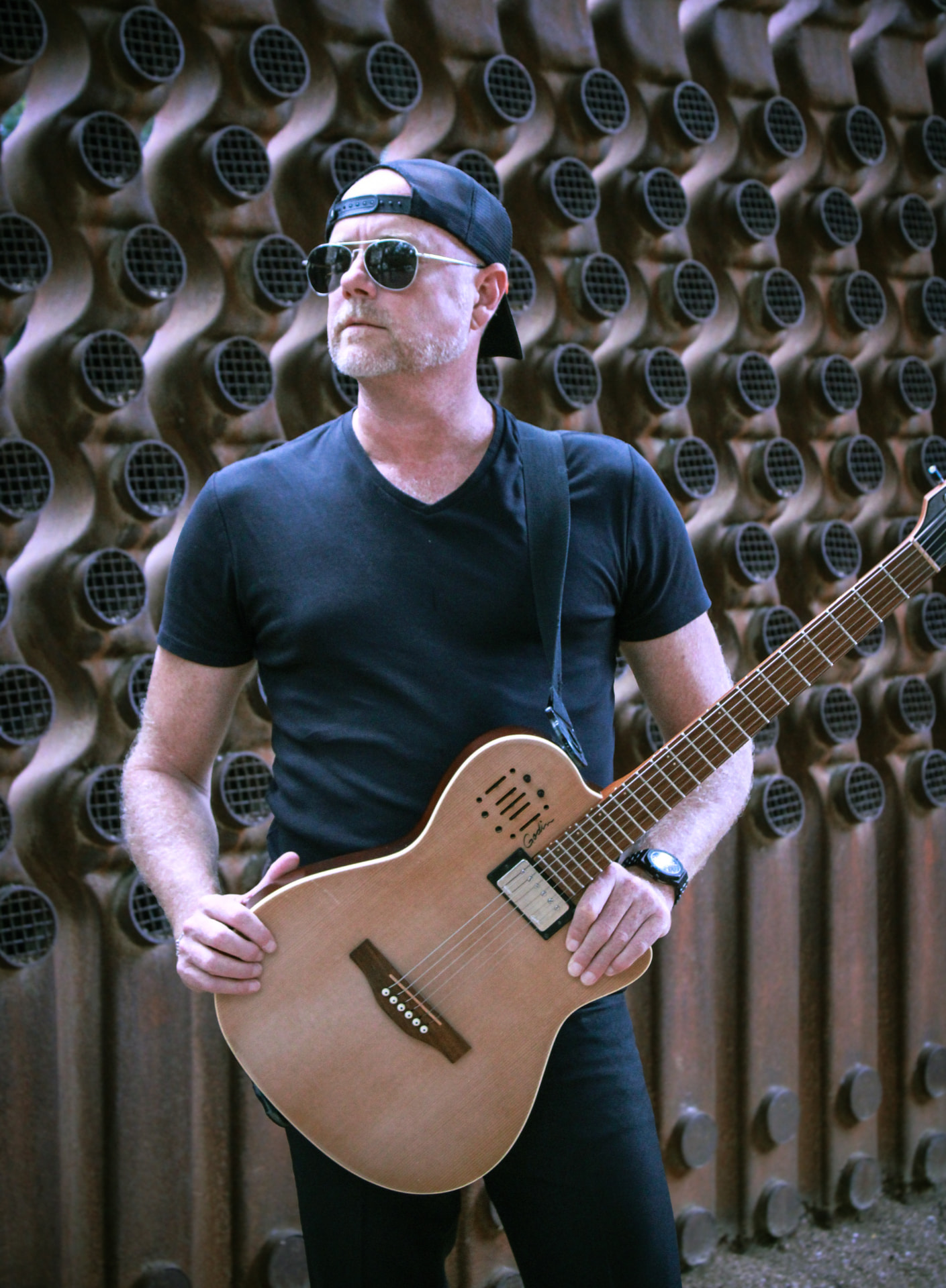 Whiskey Bravo with his acoustic-electric guitar